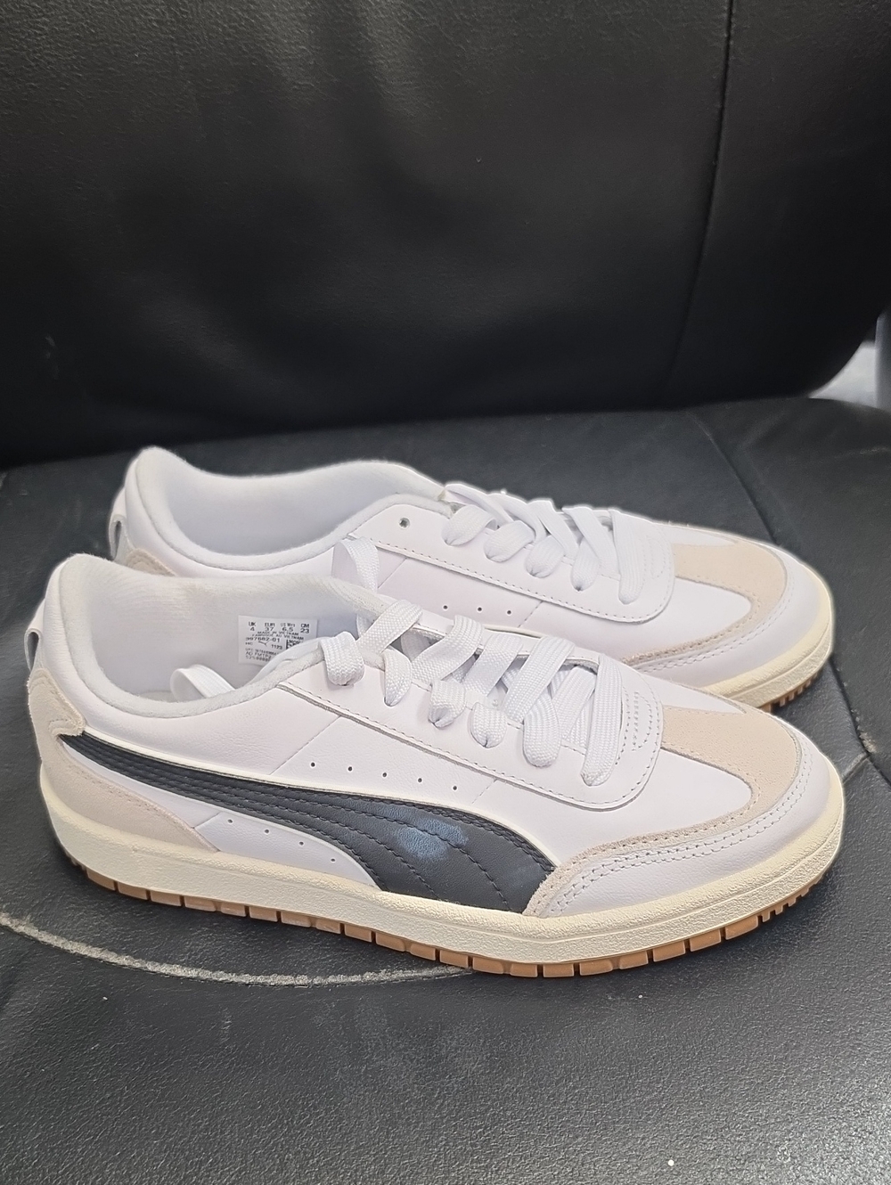 Puma White Sneakers with Black Side Stripe and Beige Accents